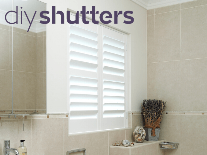 2-(1)k.png White plantation shutter blinds in cream bathroom