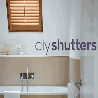 wooden velux window shutter blind in white bathroom