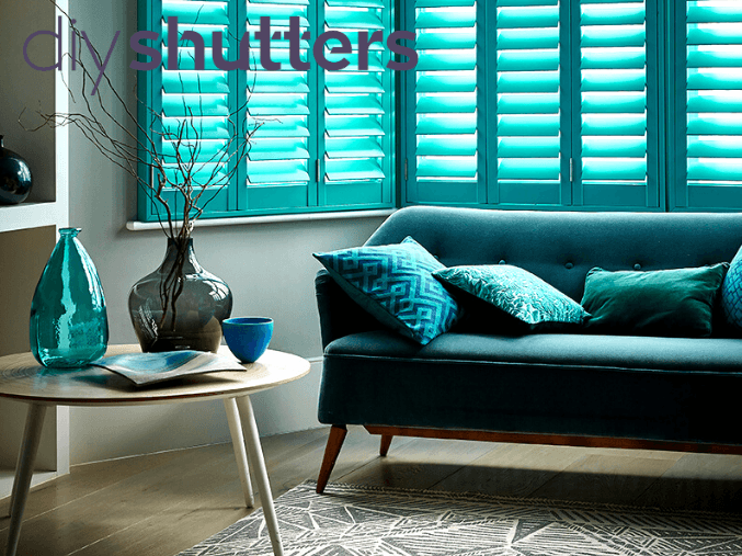 Blue bay window shutter blinds in living room